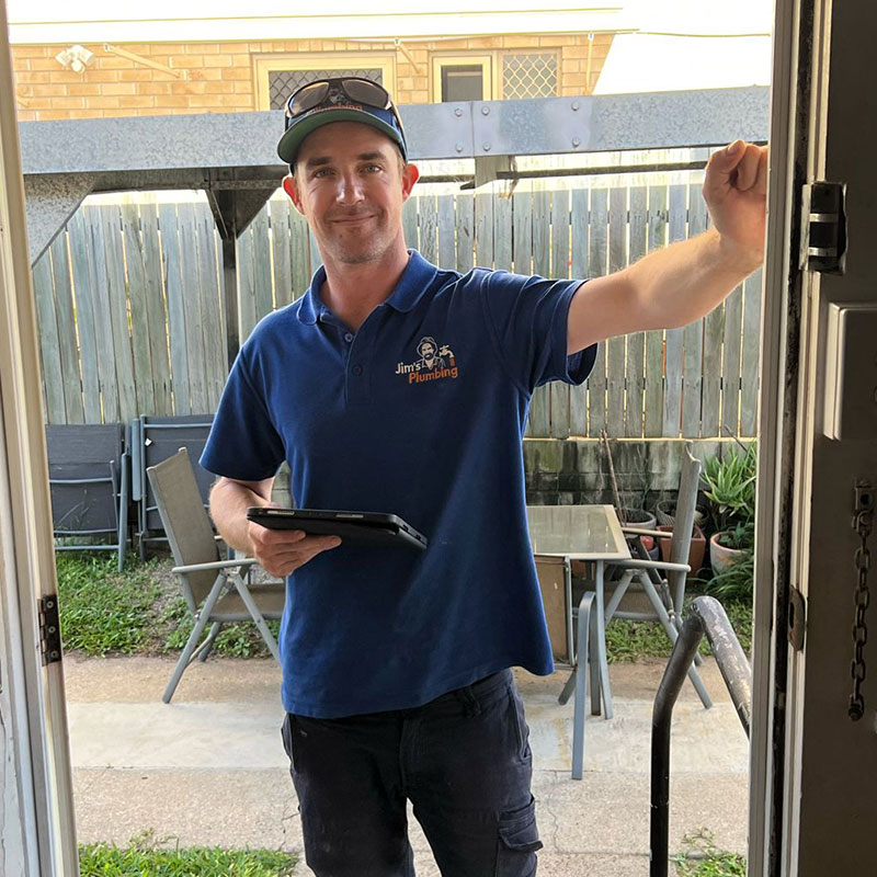 PLumber knocking on customers door